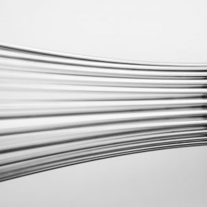 Qual é a origem do aço inox?