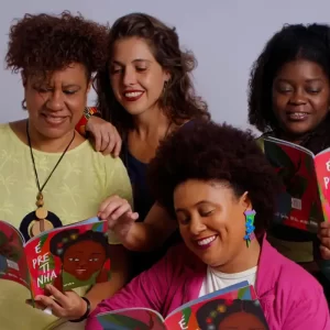Mulheres sambistas lançam livro-disco infantil com protagonista negra