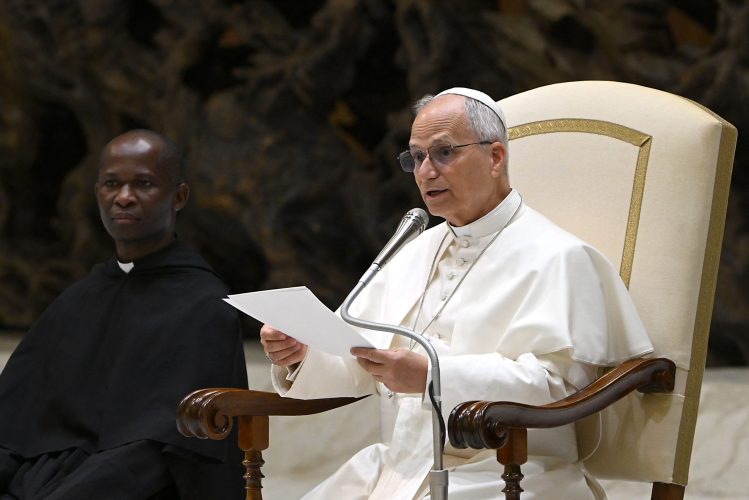 Pope Leo XIV speaks during a private audience with participants in the National Meeting of Catholic Religion Teachers, who teach religion courses in Italian public schools, promoted by the CEI (Catholic Episcopal Conference), at Paul VI Hall in the Vatican on April 25, 2026. (Photo by Andreas SOLARO / AFP)