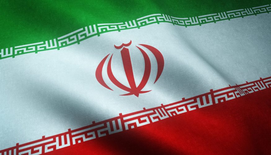 A closeup shot of the waving flag of Iran with interesting textures