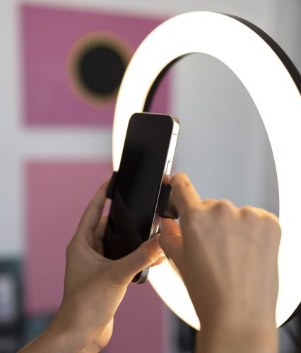 hands-holding-smartphone-side-view