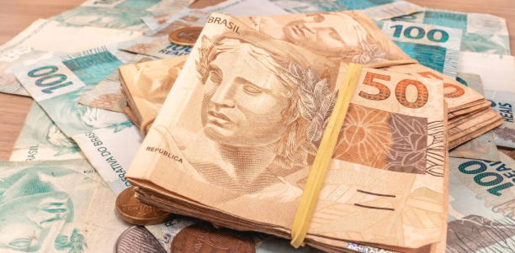 Real - Brazilian Currency. Money, Dinheiro, Real, Brasil, Brazil, Reais. A group of Real banknotes in close-up.