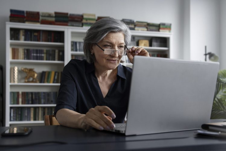 medium-shot-woman-working-laptop
