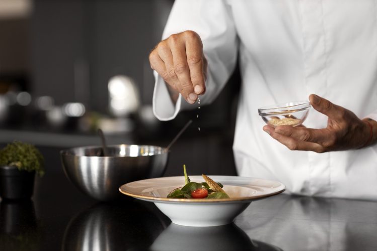 professional-chef-preparing-food-kitchen